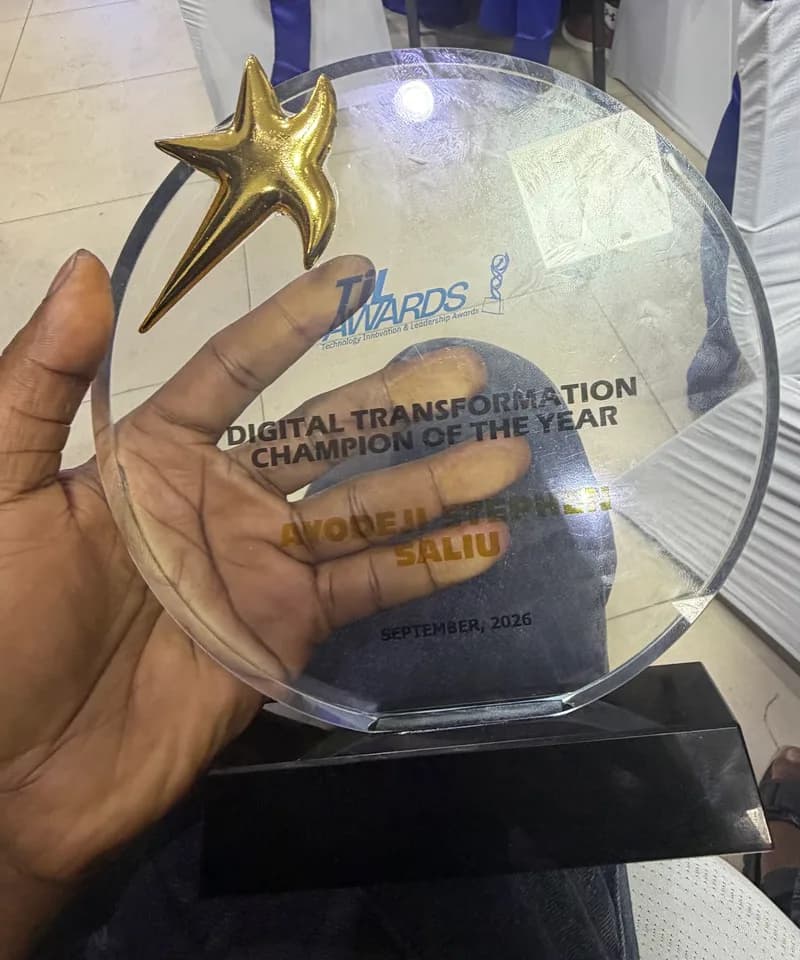 The TIL Awards trophy engraved Digital Transformation Champion of the Year, Ayodeji Stephen Saliu, September 2026